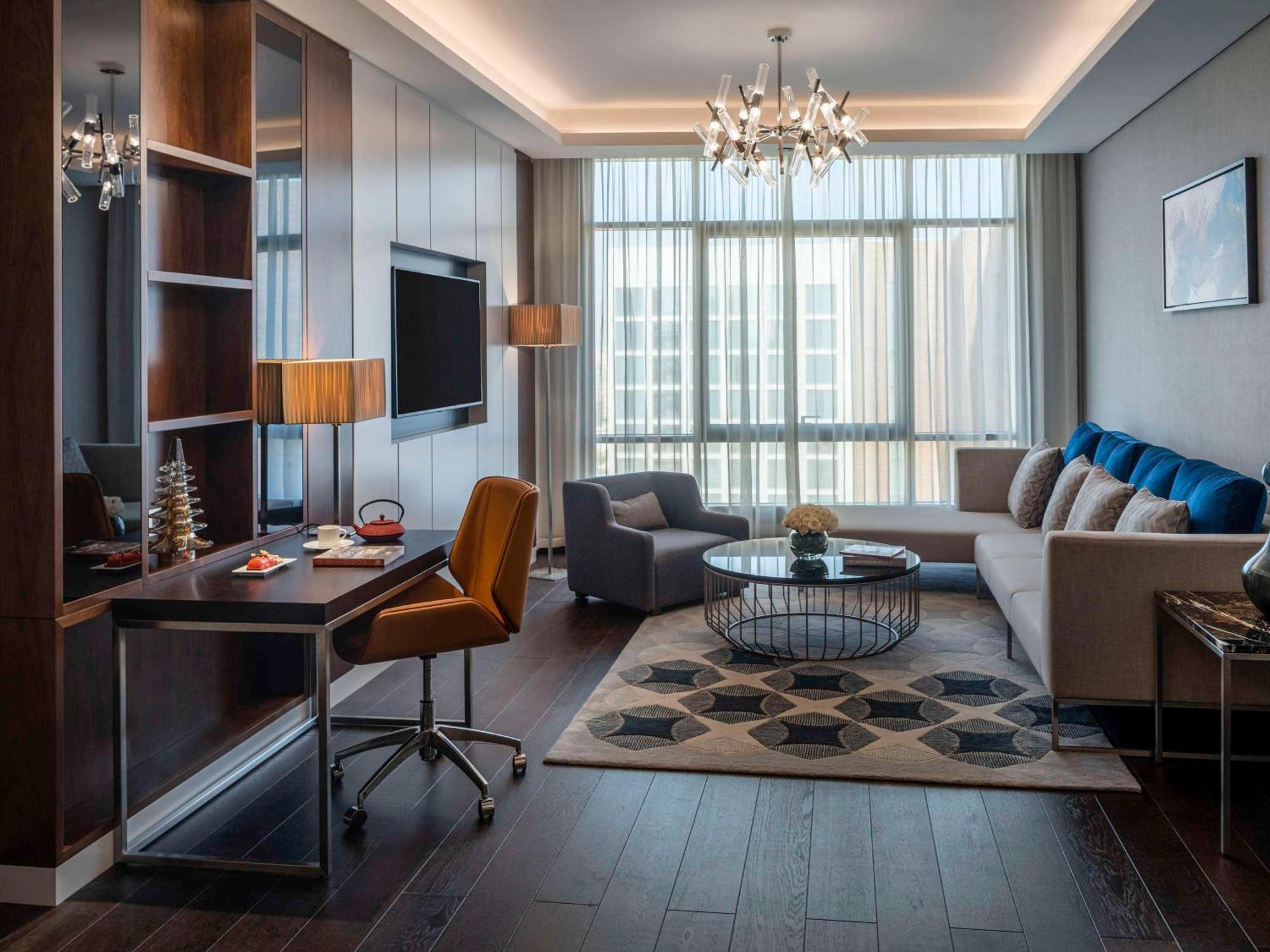 فندق وشقق موفنبيك الرياض المظهر الخارجي الصورة A living room at the hotel